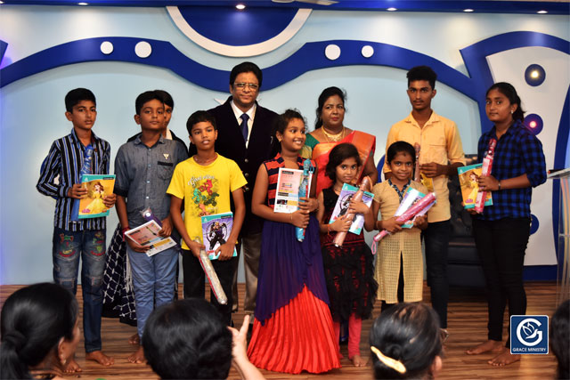 About Ten Poor and needy Students from Various Schools and Colleges of Mangalore brightened up as they received books, umbrellas and Education Scholarship from Grace Ministry on Sunday, June 16th, 2019. 